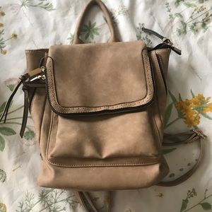 Faux leather backpack with adjustable straps